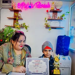 Here is another champion with his well-earned trophy and certificate from the National Level Championship. His dedication and hard work have paid off.