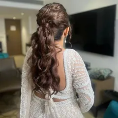 Another angle of the textured messy ponytail, showing the beautiful waves and the soft, romantic feel of the style.