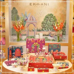 I designed this display to showcase the full splendor of the Pichwai collection. Centered around a magnificent invitation box, the suite includes coordinated stationery, gift bags, and smaller favor boxes, all adorned with the timeless, devotional art of Pichwai.