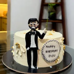 A special birthday cake for a special jiju. I created a custom fondant figurine to match his style, complete with a tuxedo. It's a fun way to add a personal touch to the celebration.