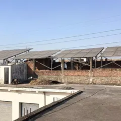 Another angle of the solar installation in Ram Nagar, showing how the panels are integrated onto the rooftop structure. This setup is designed for durability and optimal energy generation for agricultural machinery.