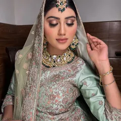 Another angle of this serene and beautiful Nikkah bride. The sheer dupatta and soft makeup create a dreamy and timeless feel.