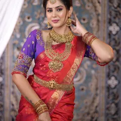 A beautiful bride showcasing a complete antique gold replica set. The layered necklaces and intricate choker are designed to make a grand statement for a traditional wedding ceremony.