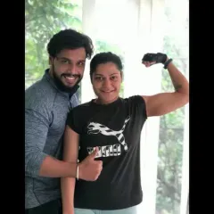 Celebrating a client's progress. My role as a coach is to support and motivate you every step of the way on your fitness journey.