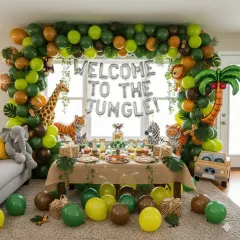 Explore a wild adventure with our 'Welcome to the Jungle' birthday theme. We use a rich palette of greens and browns to create a dense jungle look, complete with a large balloon arch, animal cutouts like a giraffe and tiger, and themed props. This immersive decoration is perfect for a memorable first birthday party.