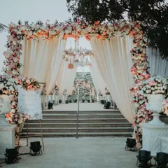 The entrance to your fairytale. I believe a wedding's story begins the moment your guests arrive, and I focus on creating breathtaking floral archways and decor that promise a magical experience within.