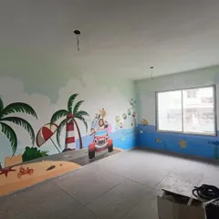 I designed this fun, panoramic cartoon mural for a large children's room. The scene combines a beach, road, and underwater world, filled with happy characters to spark imagination and play.