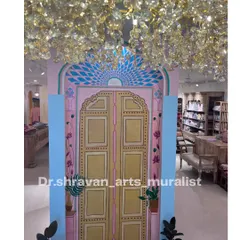 This piece was created for a Jaipur-themed clothing store in Bangalore. I painted this ornate "Jaipur door" on canvas to serve as a beautiful backdrop and photo opportunity, enhancing the store's brand and ambience.