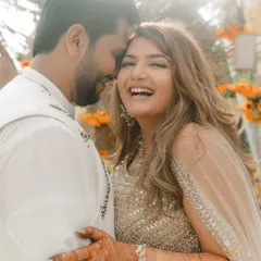 Pure, uninhibited laughter is the most beautiful thing to photograph. This candid embrace during Aditi and Dhiraj's celebration is a perfect example of the joyful, real moments I strive to capture.