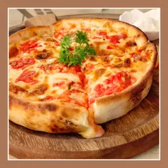 Another look at our deep-dish Chicago-style pizza. The thick, buttery crust holds a generous amount of sauce, cheese, and toppings for a hearty meal.