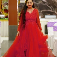 This is the full-length view of our red handwork gown, perfect for a birthday party or photoshoot. A matching dress is available for a mother-daughter combo.