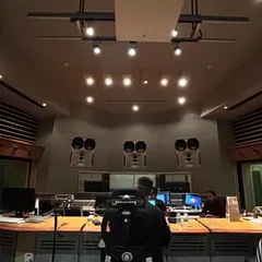 In the zone at a professional recording studio. Working with top-tier equipment and engineers is a non-negotiable part of my process to ensure broadcast-quality sound.