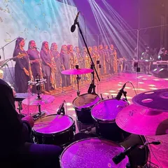 A behind the scenes view from the drummer's perspective at our 'Sakhya' concert. The stage is lit, the choir is singing, and the energy is electric.