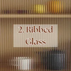Ribbed or fluted glass is a popular material we use for cabinet shutters and partitions. It provides privacy while allowing light to pass through, adding a touch of vintage charm.