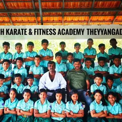 A group photo capturing the disciplined spirit of my students at the Theyyangad Dojo. We train together and grow stronger as a unit.