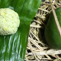 This is my Manga Chammanthi, a fresh, vibrant chutney made from raw green mangoes. Pictured here on a banana leaf next to the fruit itself, this dish celebrates seasonal ingredients at their peak, offering a zesty kick to any meal.