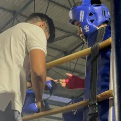 Another shot from the corner during the national championships. Clear, concise instruction is key to helping a fighter make adjustments mid-fight.