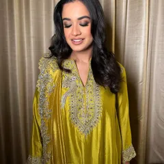 A classic smokey stare with a touch of flair. This look on a beautiful chartreuse outfit is timeless and perfect for any evening celebration.