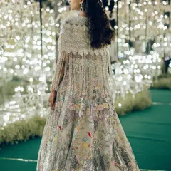 The back of Manisha's Rahul Mishra cape, showing the incredible craftsmanship and the dramatic, flowing silhouette. This is how you make an entrance.