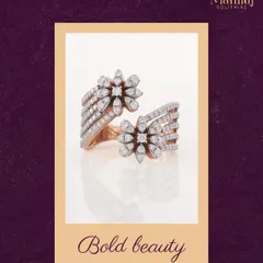 Small in size, big on style. This bold floral diamond ring is designed to stand out, with layers of sparkling petals that make a subtle yet powerful statement.