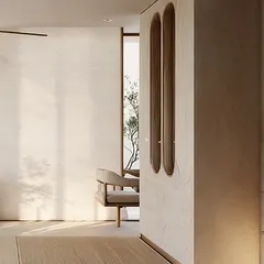 Another view of the reading retreat concept, highlighting the custom cabinetry with unique curved handles. The play of light and shadow on the textured walls creates a peaceful and contemplative mood.