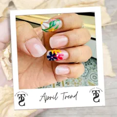 Here is a beautiful example of my detailed hand-painted nail art. This design features delicate, colorful flowers on a neutral base, creating a fresh and trendy look perfect for any season. If you have an idea, I can bring it to life.