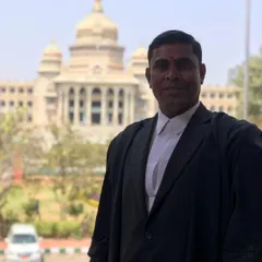 My practice is based in Bengaluru, and I regularly work within its key legal and administrative centers. This photo is taken outside the Vidhana Soudha.
