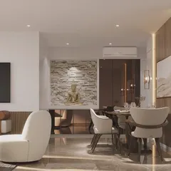 This luxurious living room design seamlessly integrates a serene Buddha statue into a modern setting. The combination of clean lines, reflective surfaces, and spiritual art creates a balanced and sophisticated space.