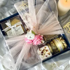 A look inside one of my luxury Diwali hampers, elegantly wrapped and ready for gifting. It includes a variety of my best-selling treats.