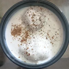 A bowl of soft and spongy Dahi Bhallas, soaked in creamy yogurt and topped with my special masala.
