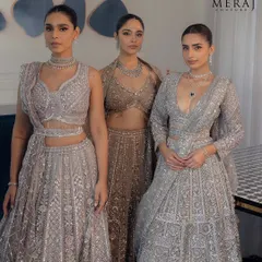 A closer look at the silver lehenga, highlighting the intricate sequin work and hand embroidery that brings timeless beauty to the modern bride.