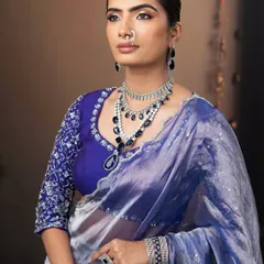 A closer look at the sharp, defined features of this reception look. The makeup is polished and sophisticated.