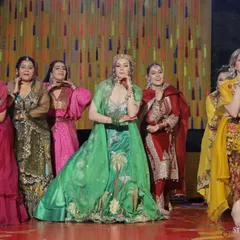 The bride and her squad striking a final pose. A well-choreographed group dance is one of the best ways to kick off the sangeet night celebrations.