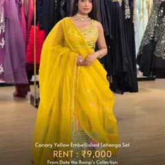 A beautiful canary yellow embellished lehenga set, perfect for a daytime wedding or festive event.