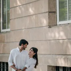 A classic, happy portrait against the colonial architecture of South Mumbai. The genuine smiles and easy connection between them make this a simple yet beautiful pre-wedding shot.