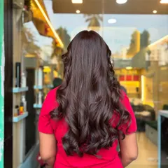 From straight and simple to wavy and rich. This before-and-after shows how a global color and some styling can completely transform your look.