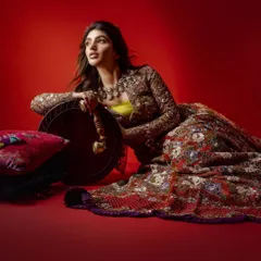 A dynamic pose with Sreeleela, showcasing the movement and flow of the embroidered lehenga. The styling was designed to be both photogenic and expressive, capturing a sense of joyful energy.
