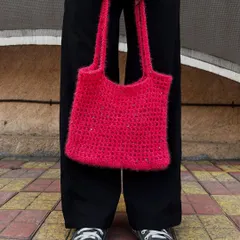 A custom order for this fuzzy pink tote bag. The yarn is incredibly soft, and I added some subtle sparkles for a little bit of glam.