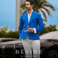 I believe in creating clothes that match your ambition. This vibrant blue summer blazer is tailored from a premium, breathable fabric and designed with a sharp, powerful silhouette for a look that is both classic and confident.