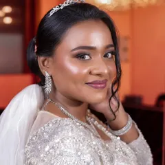 A close-up of this Christian bride's look, complete with a delicate tiara. The makeup is kept elegant and timeless, ensuring she looks and feels like a princess on her special day.