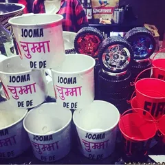 "Jumma Chumma De De!" These custom-printed buckets are a fun and thematic way to serve drinks or hold ice, bringing a classic Bollywood hit to life right at the bar.
