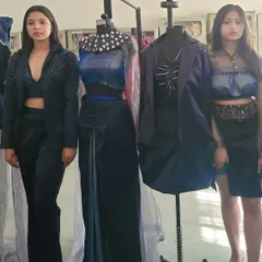 Reviewing student creations that showcase a blend of modern silhouettes and intricate detailing. I provide constructive feedback on everything from fabric choice to finishing, helping students elevate their designs to a professional standard.