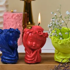 My Jesmonite figurine holders are wonderfully versatile. Here you can see them used as a candle holder, a mini vase for dried flowers, and as standalone decor pieces.