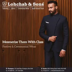 Mesmerize them with class. This dark navy Indo-Western suit features a unique overlapping asymmetrical cut and a mandarin collar, offering a modern twist on classic formal wear.