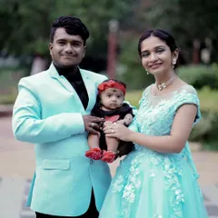 Another shot of the happy family, capturing a precious memory. My styling helps ensure everyone looks their best and the photos are cohesive.