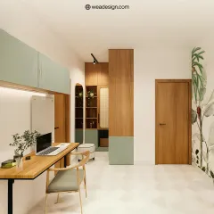 A view of the integrated study area in this minimalist bedroom, featuring a simple wooden desk and overhead cabinets that maintain the room's airy feel.