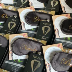 Here’s a look at my custom groomsmen proposal boxes. I focus on sleek, practical gifts like personalized hip flasks and eye masks, premium grooming products from The Man Company, and of course, some Ferrero Rocher for a touch of sweetness.