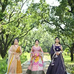A beautiful lineup of our Mehendi and Sangeet outfits, showcasing a range of colors from mustard yellow to pink and deep purple.