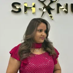 She's glowing with her new hair color. A happy client is the best advertisement.