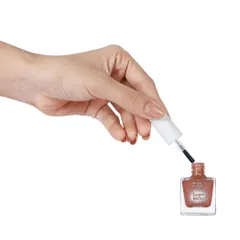 A lifestyle action shot showing a hand applying the nail polish. This helps customers visualize using the product.